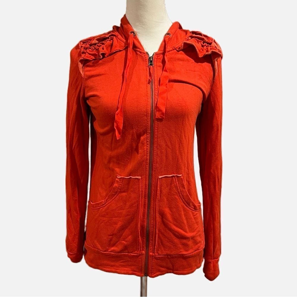 Zip up hoodie with ruffle detailing to shoulder.